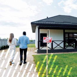 Couple walking towards new home.